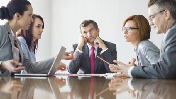 Businesspeople arguing in meeting